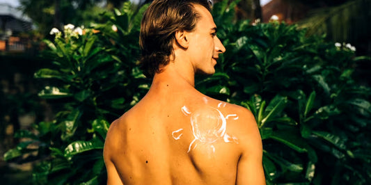 A man with a sunscreen on back